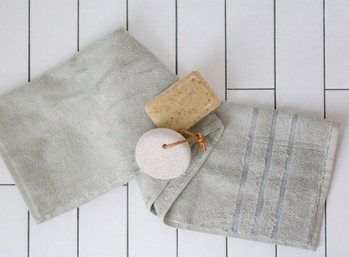 gray towel on a tile counter