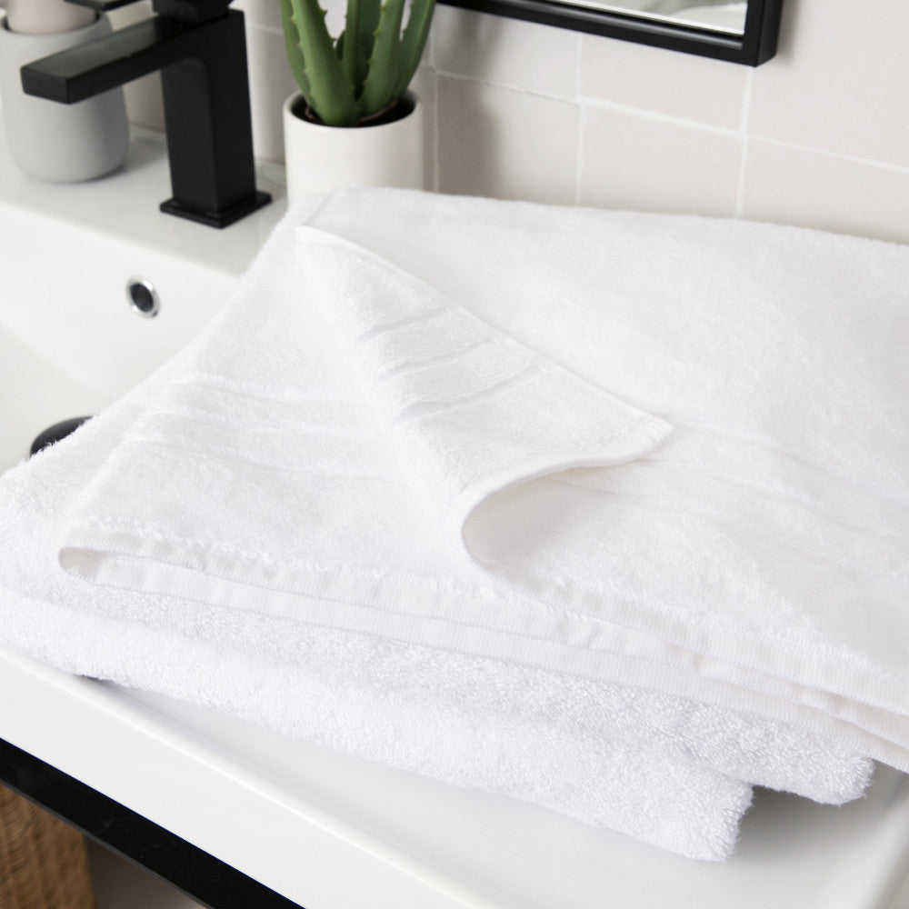folded white bath sheets