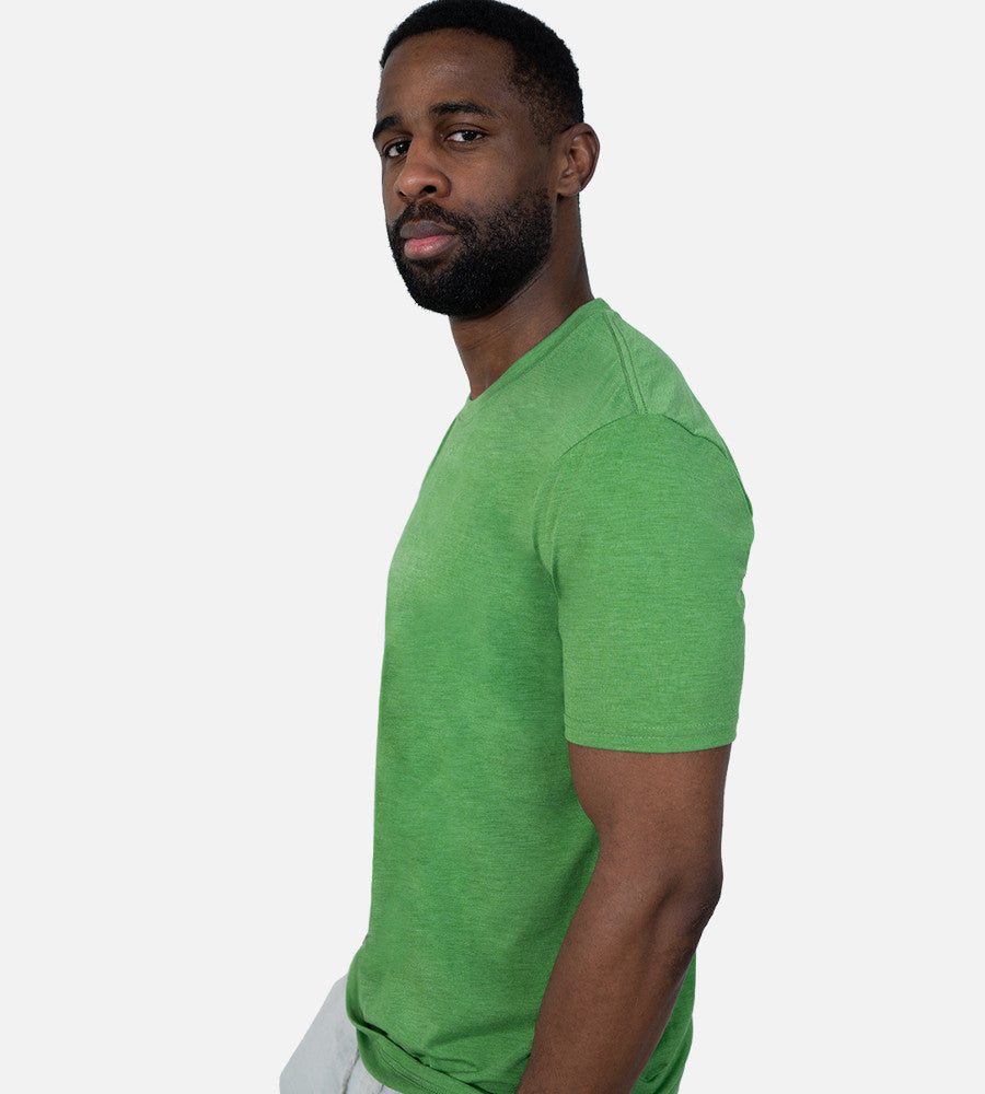 side view of model wearing Palm Green comfort crew tee~Palm Green