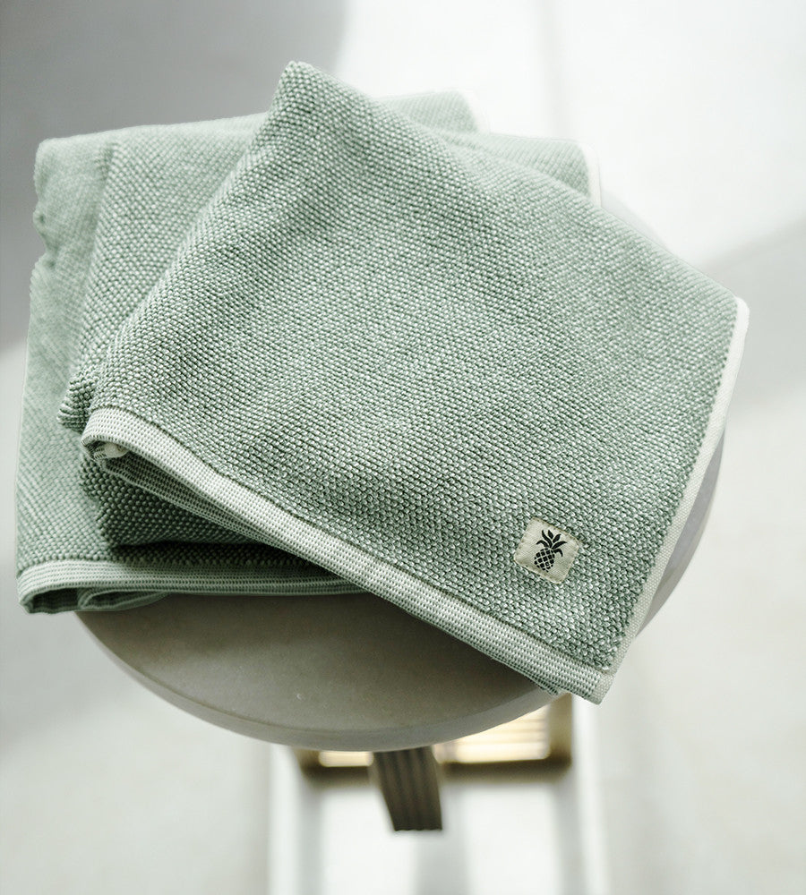 folded view of two-tone oasis green bath sheet~Oasis Green