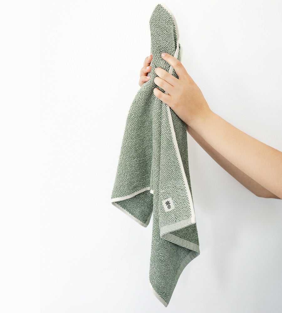 models hand holding up hand towel