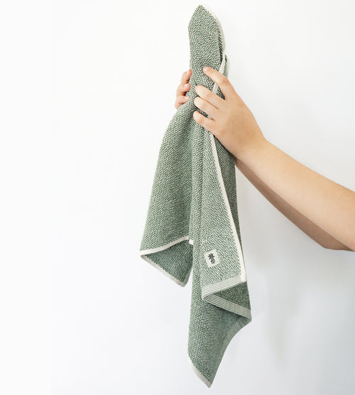 models hand holding up hand towel