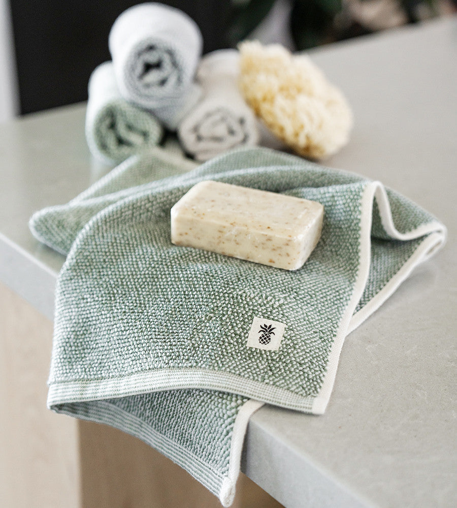 hand towel laying on the counter~Oasis Green