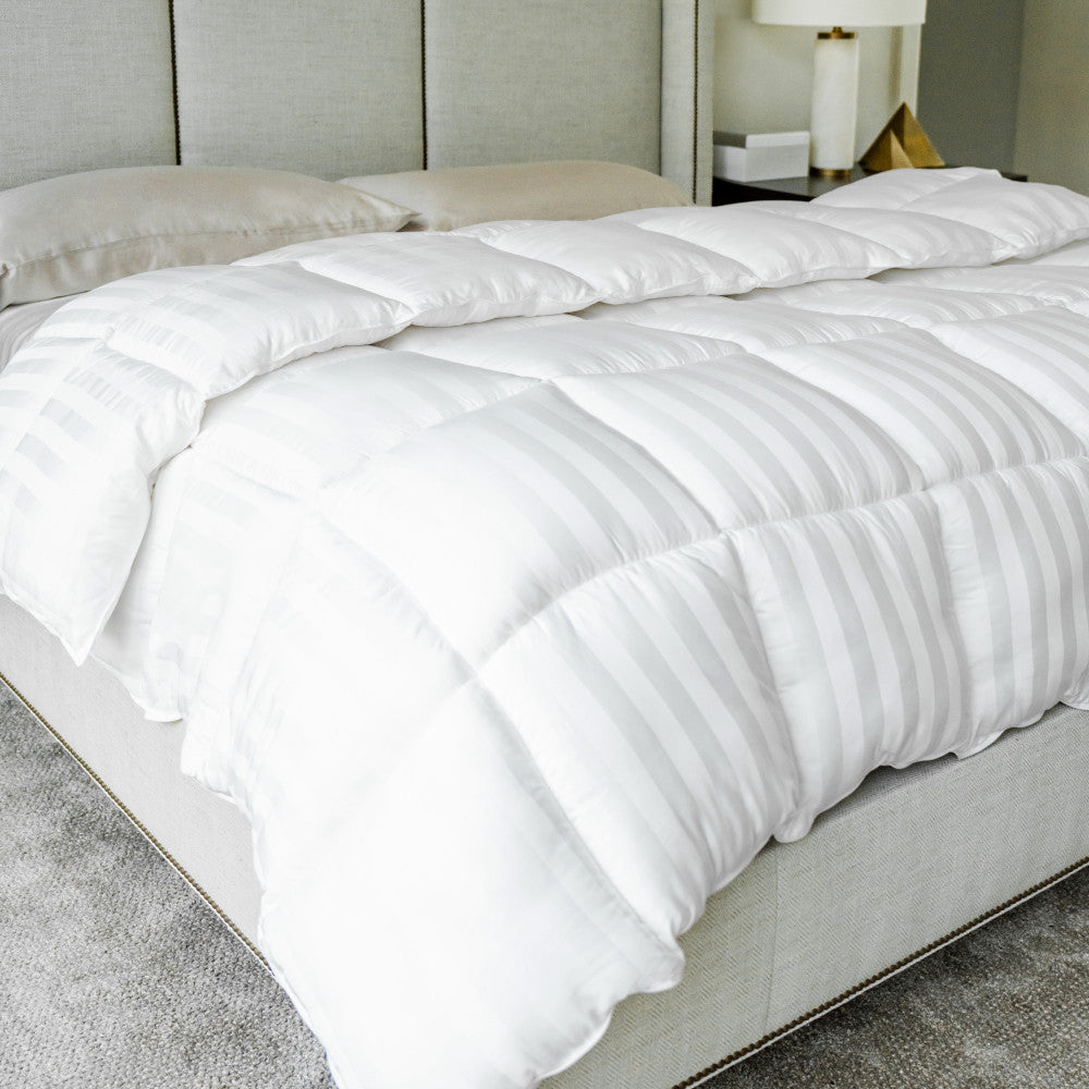 comforter laying flat on a bed