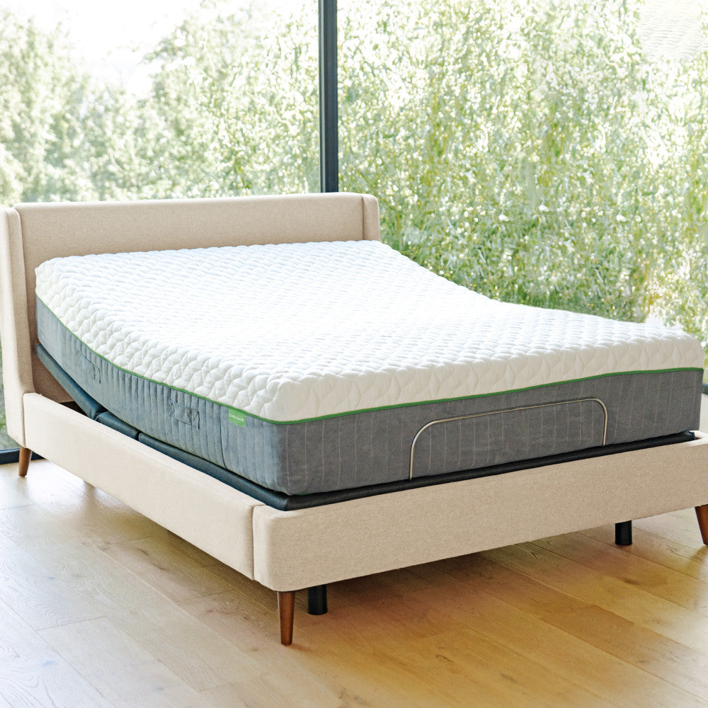 natural bed frame with mattress on it