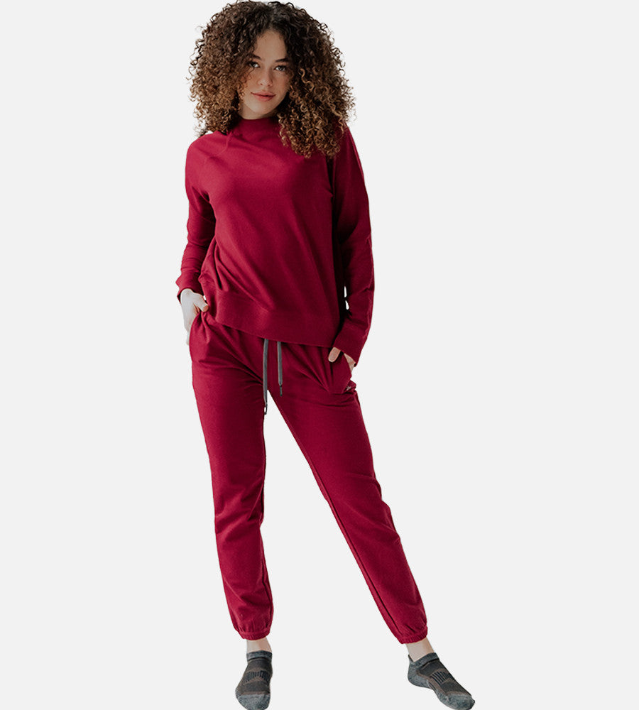 front view of model wearing Pomegranate joggers~Pomegranate