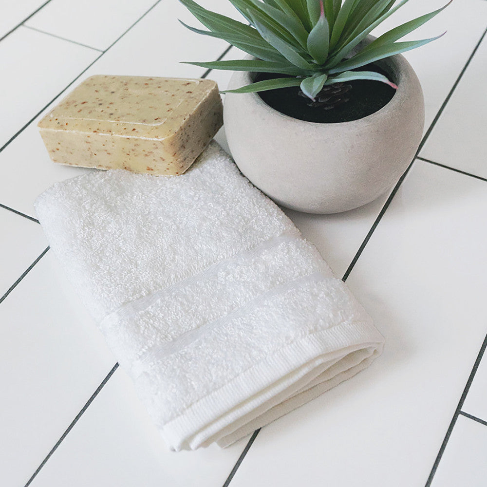folded white washcloth~White