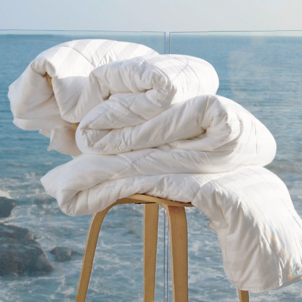 comforter folded on a chair~Full/Queen