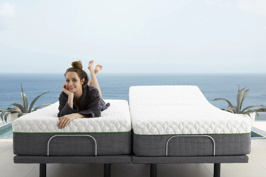 a woman lying on a resort mattress , set against an ocean background.