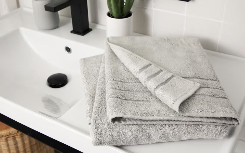 a bamboo towel on a bathroom counter