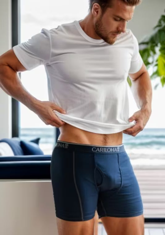 man wearing navy blue boxer briefs