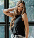 front view of model wearing soft black sleep tank