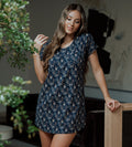 front view of model wearing midnight floral print sleep shirt