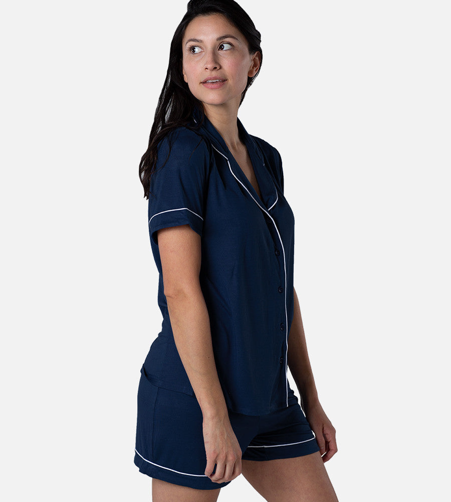 side view of model wearing nightfall navy short sleep set