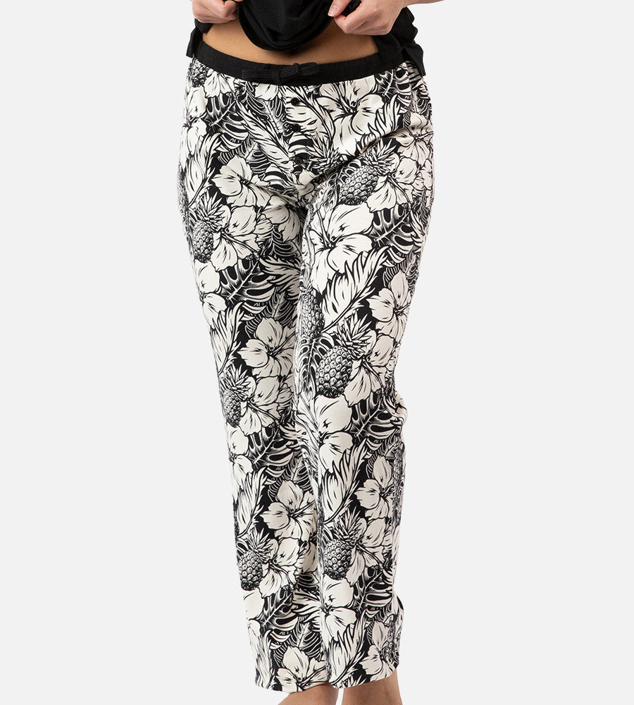 front view of models legs wearing soft black pineapple print pants