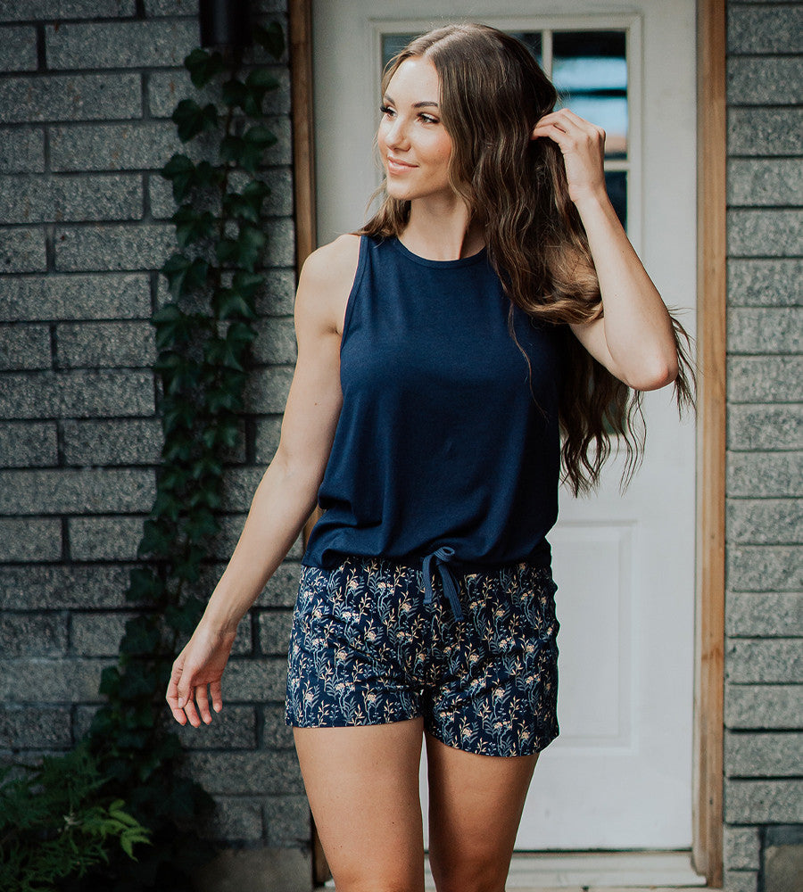 model wearing midnight floral print sleep shorts