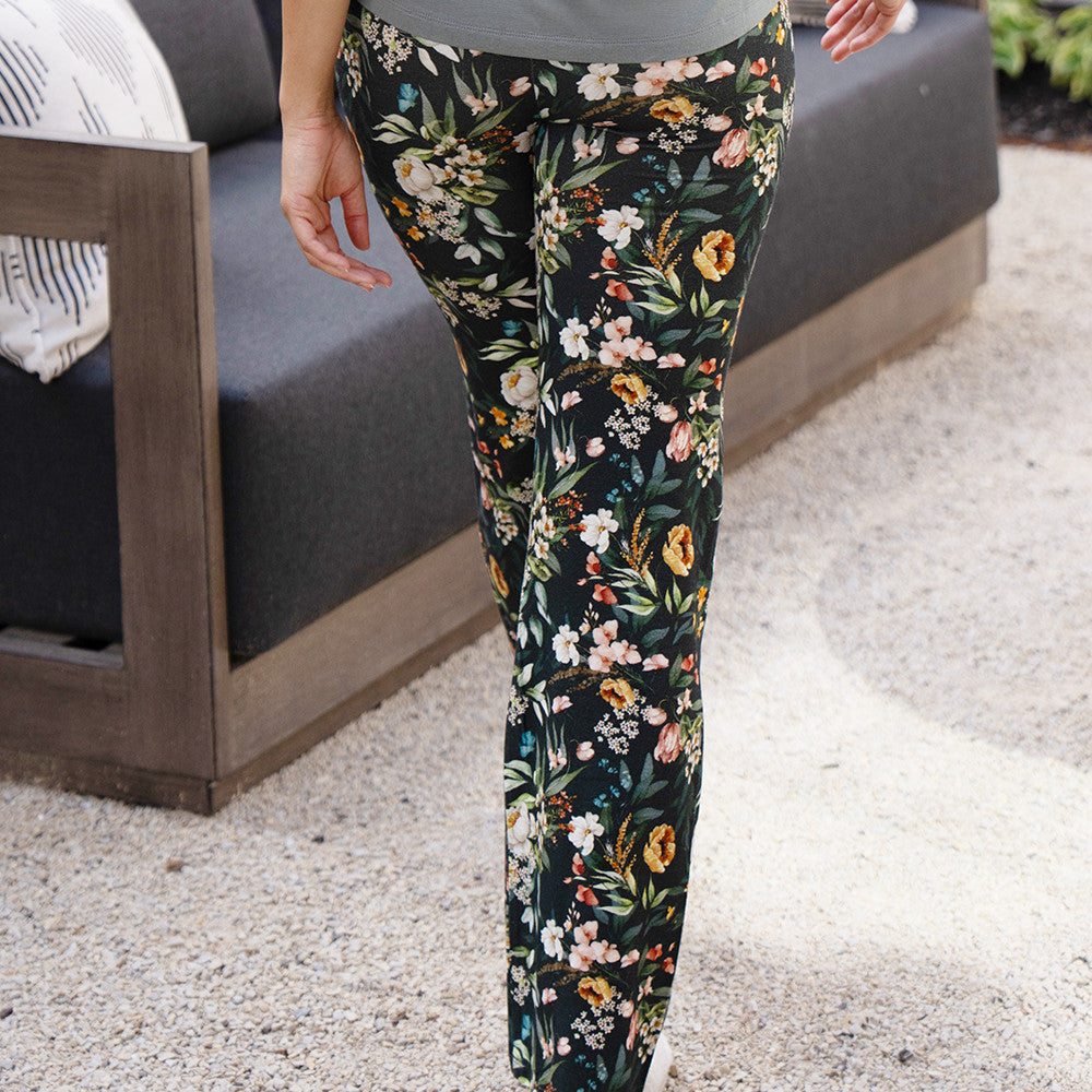side view of models legs wearing vintage floral print sleep pants