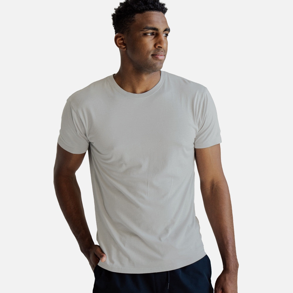 back view of model wearing silver shore crew tee