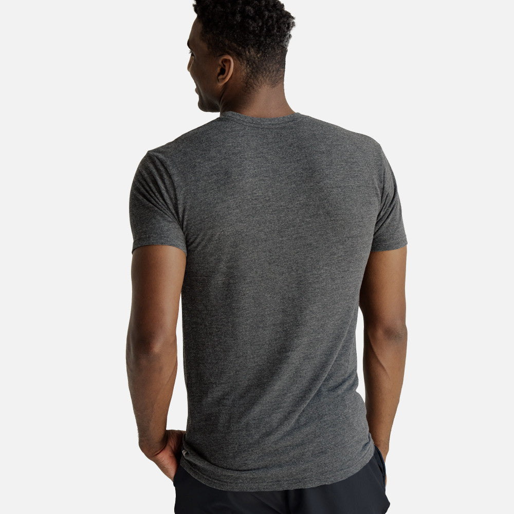 back view of model wearing charcoal heather crew tee