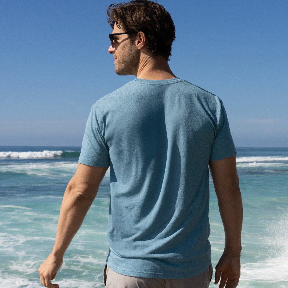 back view of model wearing coastal blue crew tee