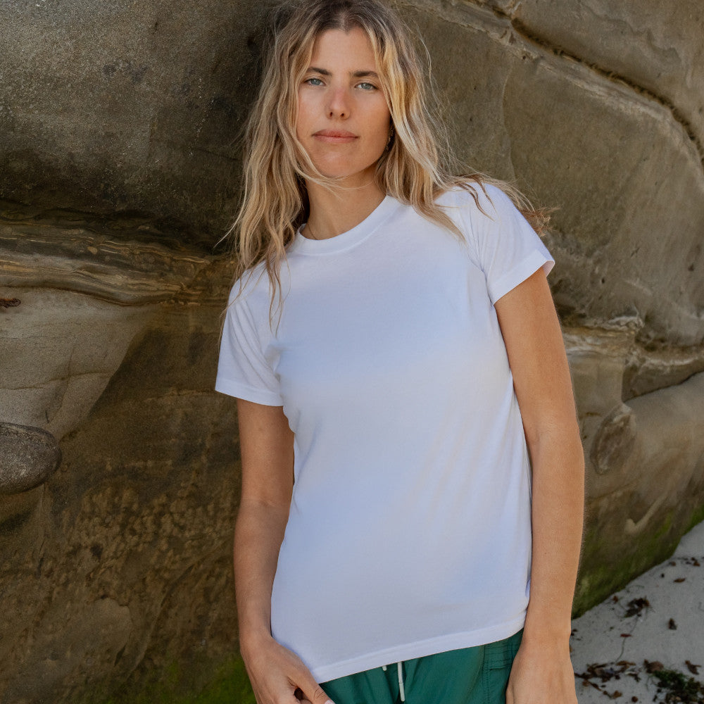 front view of model wearing white crew tee