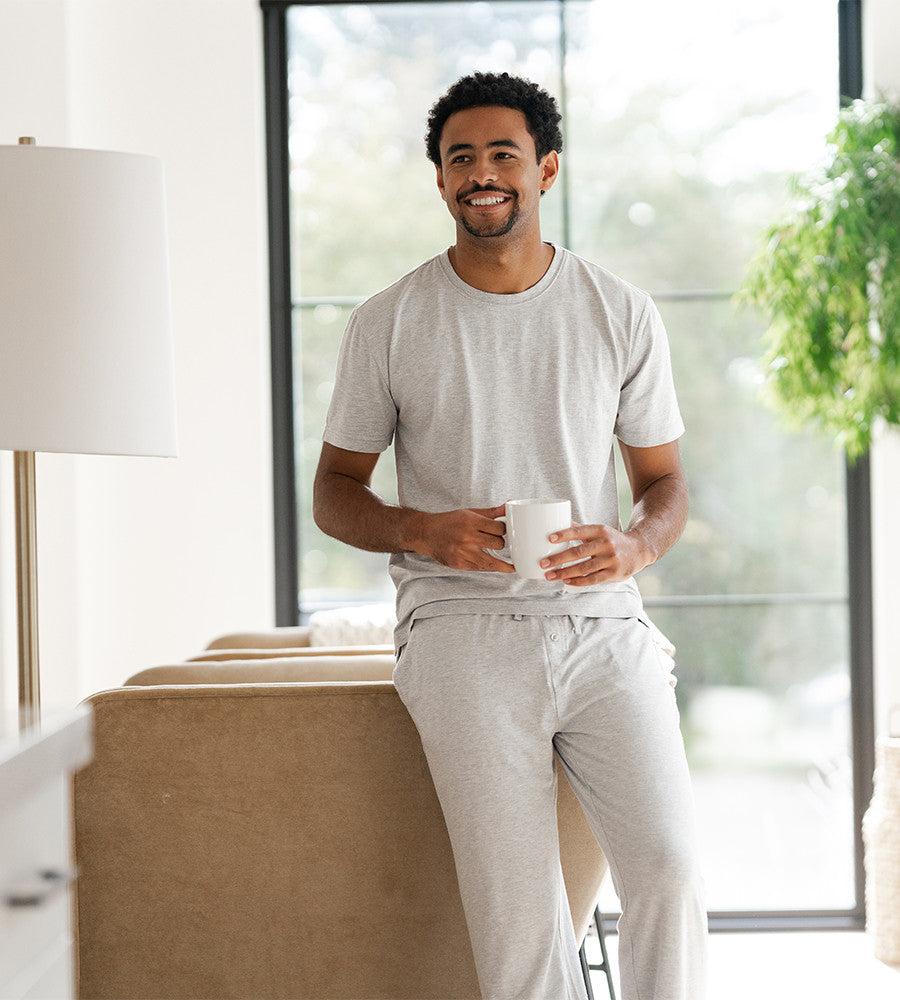 front view of model wearing light gray crew