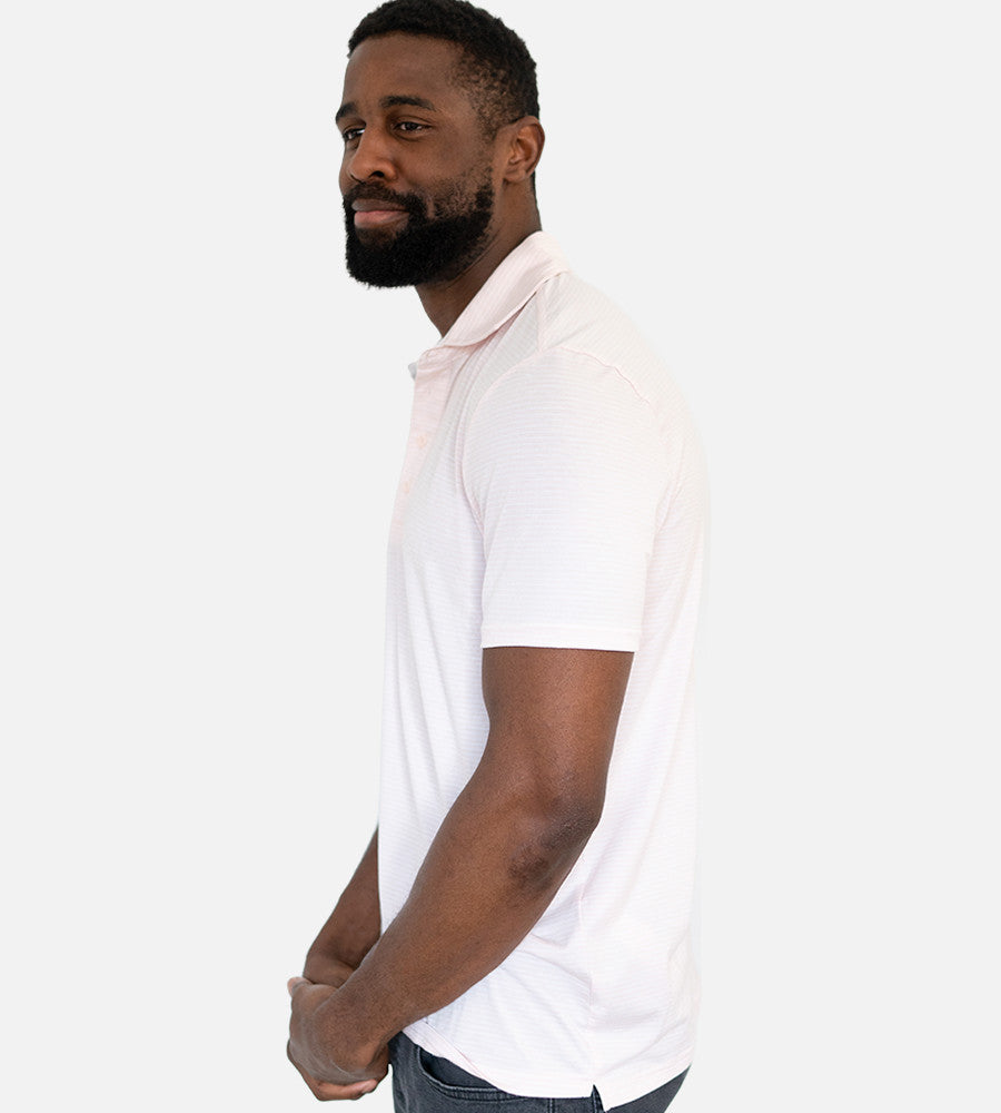 side view of model wearing stripes light pink comfort polo~Stripes Light Pink/White