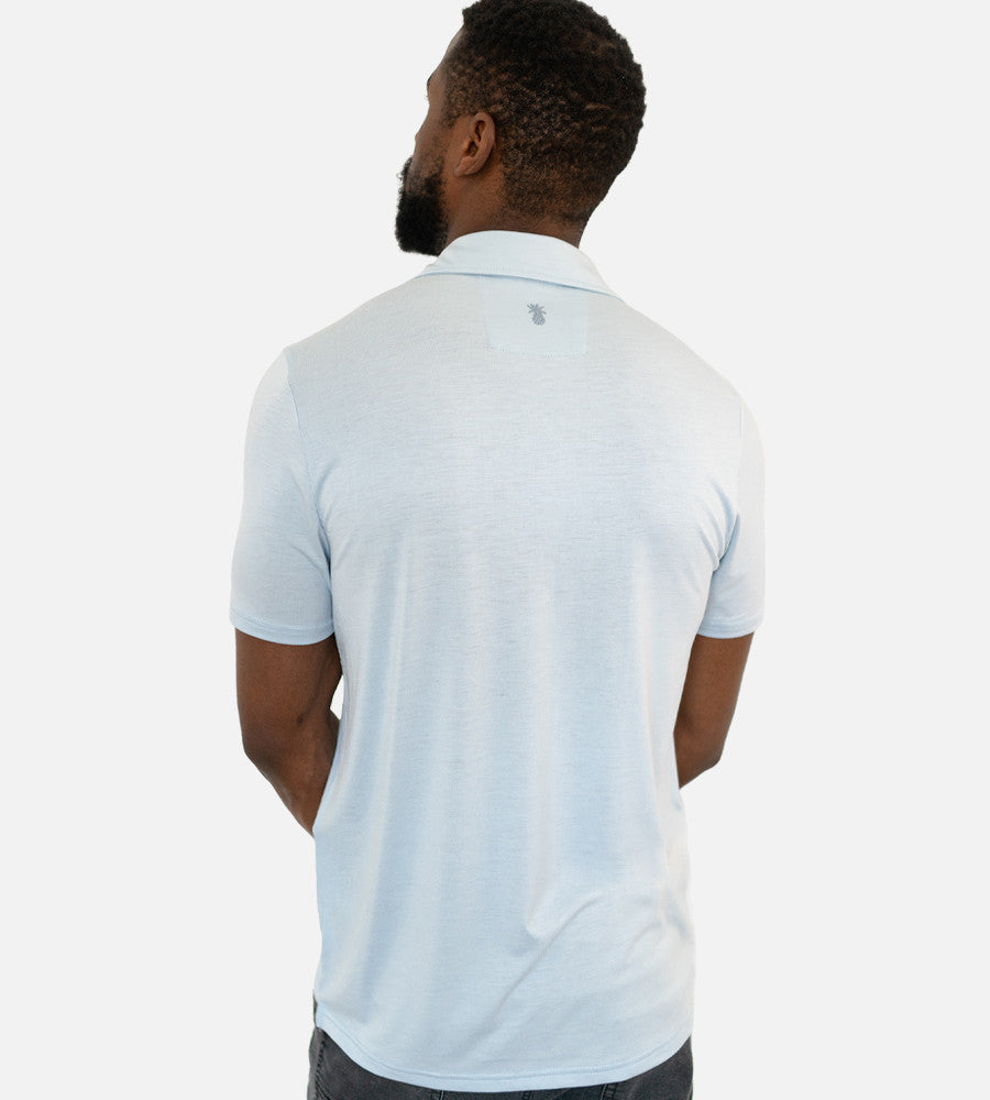 back view of model wearing light blue comfort polo~Light Blue
