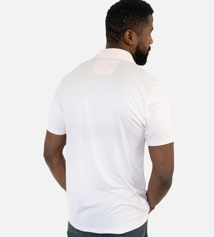 back view of model wearing stripes light pink comfort polo~Stripes Light Pink/White
