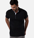 front view of model wearing dot black/white comfort polo~Dot Black/White