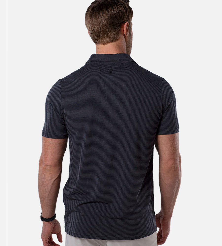 back  view of model wearing stripes charcoal/black comfort polo~Stripes Charcoal/Black
