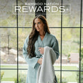 Bamboo Nation Rewards+ A woman wearing a teal waffle knit robe
